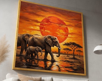 May include: An oil painting depicts a family of elephants walking across a reflective surface under a large orange sun. The artwork is framed in gold and features a warm color palette of oranges, browns, and yellows, evoking a sunset scene.