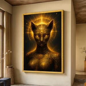 May include: A framed artwork featuring a stylized cat-like figure with intricate golden patterns. The artwork has a dark background with a golden halo effect around the cat's head. The cat's eyes are a bright yellow.