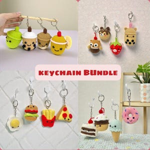 May include: A collection of crocheted keychains featuring food and drink designs. Includes a green bubble tea, a burger, fries, pizza, a slice of cake, an ice cream cone, and a donut. The text "KEYCHAIN BUNDLE" is also visible.