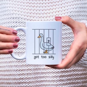 got too silly goose mug filled with coffee