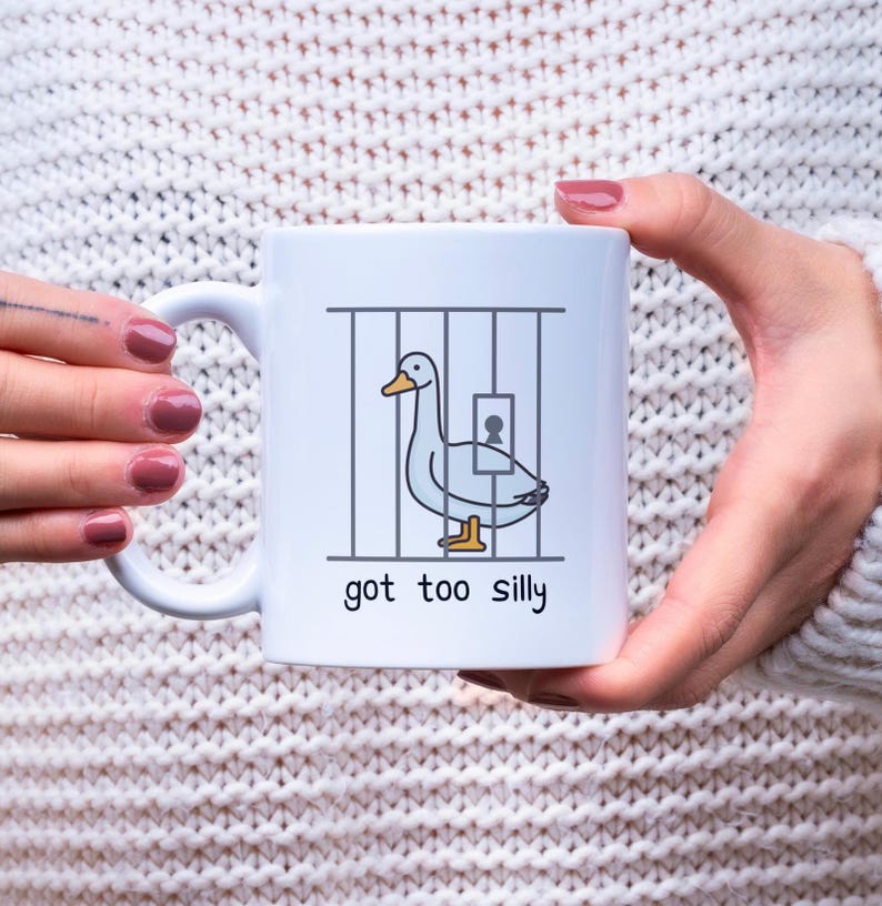 got too silly goose mug filled with coffee