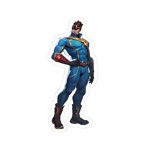 May include: A die-cut sticker featuring a character in a blue tactical suit with gold accents, a red visor, and black gloves. The character wears a belt with a red circular emblem, dark boots with red detailing, and a red circular device on the right forearm.