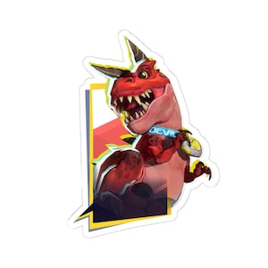 May include: A sticker featuring a cartoon dinosaur with red and pink skin, sharp teeth, and horns. The dinosaur wears a blue collar with the word "DEVIL" and a gold tag. The sticker has a white border with yellow and black accents.
