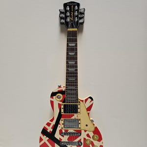 Handmade to order custom wood cutouts. Van Halen Mini Les Paul guitar