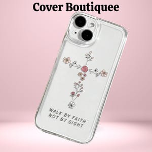May include: Clear phone case with a floral cross design and the text "Walk by faith not by sight".