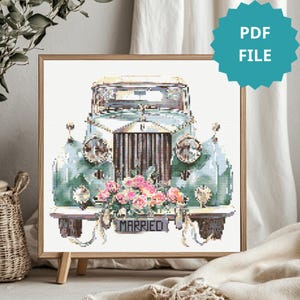 May include: Cross-stitch pattern of a vintage car in shades of teal and cream, adorned with pink flowers and a "MARRIED" license plate. The artwork is framed in a wooden frame and includes a "PDF FILE" label.