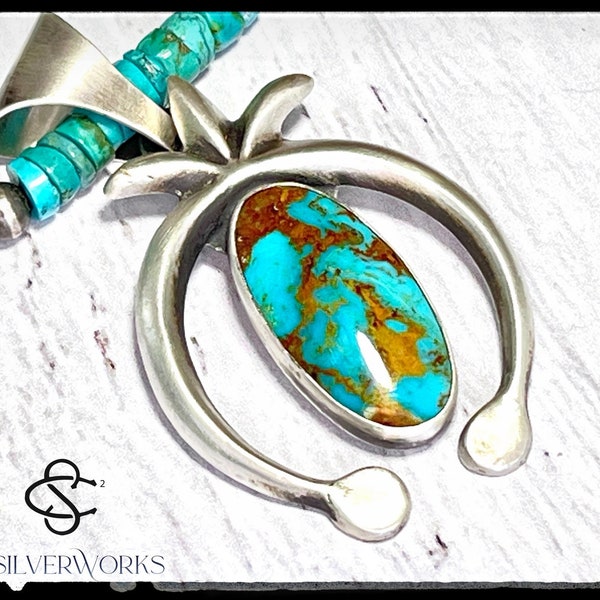 Sterling silver and Kingman turquoise handcrafted Naja pendant