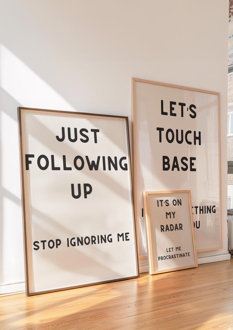A set of four minimalist black-and-white digital art prints featuring sarcastic translations of common corporate phrases. Lets Touch Base I Need Something From You, Just Following Up Stop Ignoring Me, Its On My Radar Let Me Procrastinate, and Thanks For Your Input No One Asked. Perfect for office decor, work-from-home spaces, or as a gift for coworkers who appreciate workplace humor.