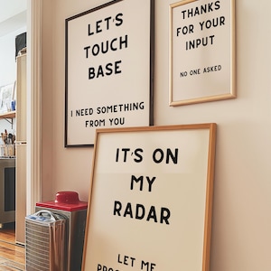 A set of four minimalist black-and-white digital art prints featuring sarcastic translations of common corporate phrases. Lets Touch Base I Need Something From You, Just Following Up Stop Ignoring Me, Its On My Radar Let Me Procrastinate, and Thanks For Your Input No One Asked. Perfect for office decor, work-from-home spaces, or as a gift for coworkers who appreciate workplace humor.