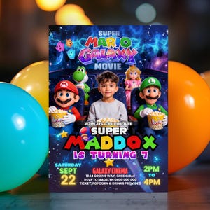 May include: A Super Mario Galaxy Movie themed birthday invitation. The invitation features Mario, Luigi, Princess Peach, and Yoshi in a movie theater setting. The invitation is for Maddox's 7th birthday, with the date, time, and location.