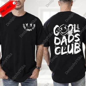 May include: Black t-shirt with white text and graphics. The front features "COOL DADS CLUB" in a curved design. The back displays a larger design with a melting smiley face and the words "COOL DADS CLUB". A PNG+SVG tag is in the upper left corner.
