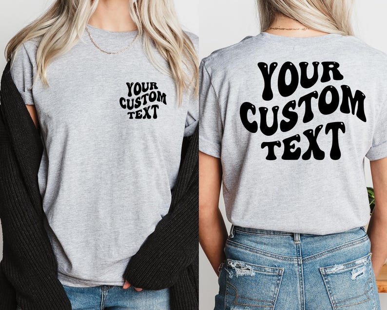 May include: A gray t-shirt with "YOUR CUSTOM TEXT" printed in black on the front and back. The text is in a retro, bubble-like font.