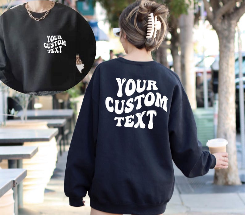 May include: Black sweatshirt with white text that says "YOUR CUSTOM TEXT" in a retro font.