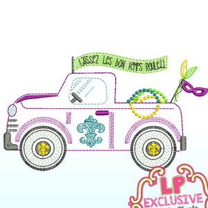 May include: A white pickup truck with a purple trim and a green banner that says "Laissez les bon temps rouler" on top. The truck has a fleur-de-lis on the side and a string of beads in the back. There is a purple and gold mask on the back of the truck.