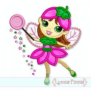 May include: A pink flower fairy with brown hair and green wings holds a pink lollipop wand. She is wearing a pink flower dress with green accents and has large green eyes.