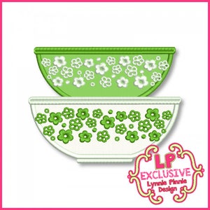 May include: Two green and white bowls with a floral pattern. The top bowl has white flowers on a green background. The bottom bowl has green flowers on a white background.