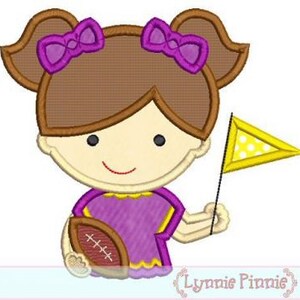 May include: An embroidered design of a girl with brown hair and purple bows holding a football and a yellow flag with white polka dots.