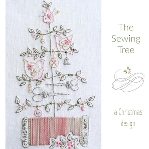 May include: Embroidered Christmas tree design featuring a sewing theme. The tree is decorated with birds, scissors, spools of thread, and other sewing-related items. The text "The Sewing Tree" and "a Christmas design" is included.