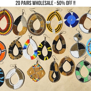 May include: An assortment of beaded earrings in various shapes and colors, including orange, black, white, yellow, and blue. The earrings are adorned with intricate beadwork and feature a hook closure. The image includes the text "20 PAIRS WHOLESALE - 50% OFF !!".