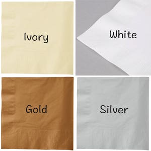 May include: Four napkins in different colors: ivory, white, gold, and silver. Each napkin has the color name printed on it.