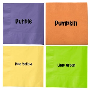 May include: Four square napkins in different colours: purple, pale yellow, pumpkin orange, and lime green. Each napkin has the colour name printed on it in black.