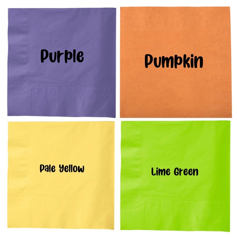 May include: Four square napkins in different colours: purple, pale yellow, pumpkin orange, and lime green. Each napkin has the colour name printed on it in black.