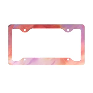 Puede incluir: Un marco de matrícula con un diseño abstracto en tonos rosa, naranja y morado. El marco tiene forma rectangular con cuatro orificios de montaje. El diseño se asemeja a una acuarela.