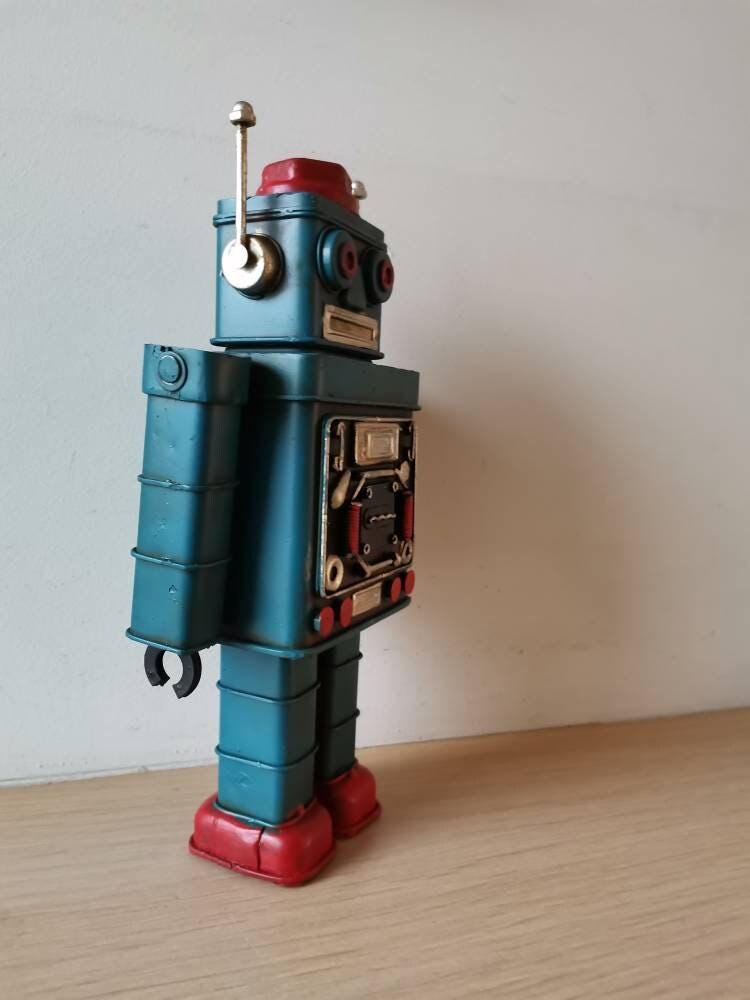 青いロボットおもちゃ、ブリキの金属製ロボットおもちゃ、可動部分の