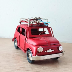 Vintage, italian car miniature, retro collectible miniature, red 500 with blue skiis on rack, red italian car miniature