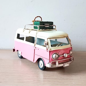 Retro van miniature, van replica in pink and white with suitcase and basket on baggage rack, baby pink hippie van replica