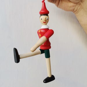 Wooden pinocchio figurine, vintage pinocchio toy with movable parts, vintage pinocchio miniature toy, or ornament