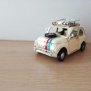 Vintage, little car miniature with french colours, retro collectible miniature, white 500 car with spare tyre on hood, early nineties
