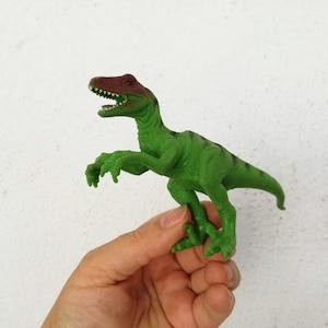 Vintage green dinosaur, plastic green dinosaur toy with brown head, tyrannosaurus rex, plastic figurine toy, vintage eighties dino toy
