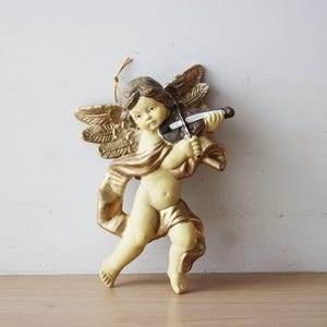 Vintage angel ornament with violin, plastic angel-cherub in beige, gold and brown, vintage cherub figurine with violin, late eighties