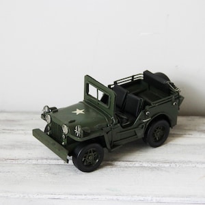 Green army jeep, retro army jeep miniature, collectible tin replica of army jeep, vintage classic jeep miniature