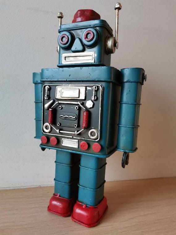 青いロボットおもちゃ、ブリキの金属製ロボットおもちゃ、可動部分の