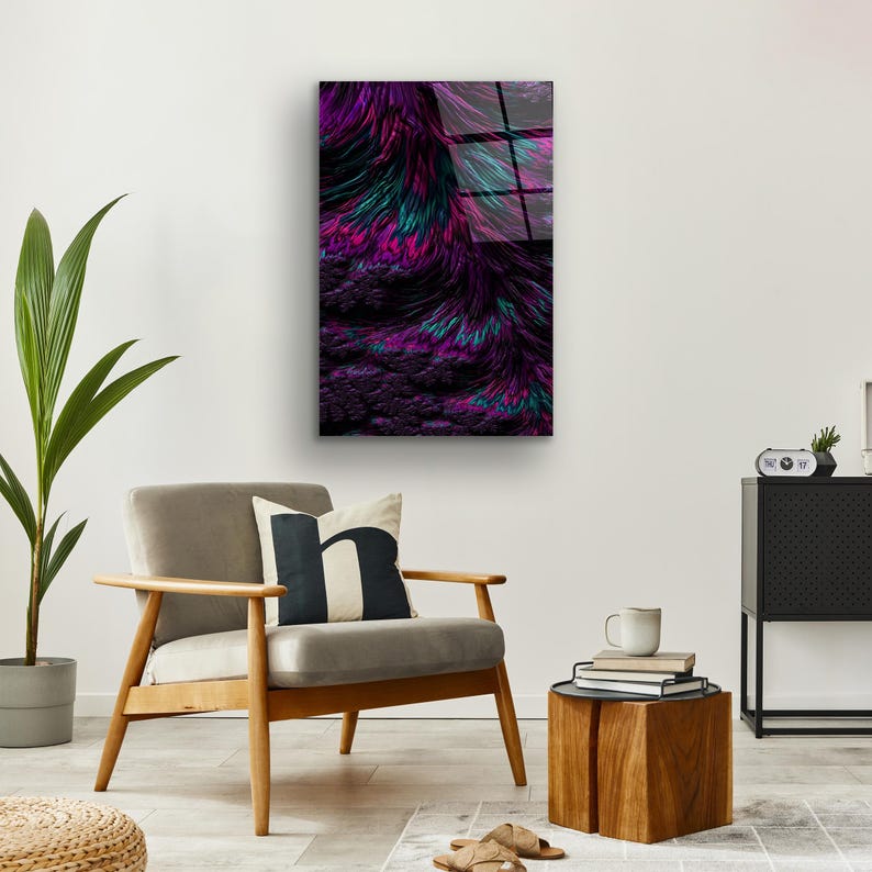 May include: Abstract wall art featuring a vibrant display of colors. The artwork showcases a blend of purple, teal, and pink hues, creating a dynamic and textured visual effect. The piece is rectangular and mounted on a white wall, adding a modern touch to the interior.