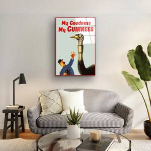 May include: A vintage Guinness advertisement featuring a man in a blue uniform reaching out to a large ostrich with the text "My Goodness My GUINNESS".