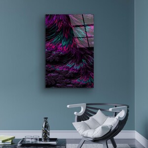 May include: Abstract art print featuring a vibrant display of colors. The artwork showcases a blend of purple, magenta, and teal hues, creating a dynamic and textured visual effect. The piece is mounted on a wall, adding a modern touch to the room's decor.
