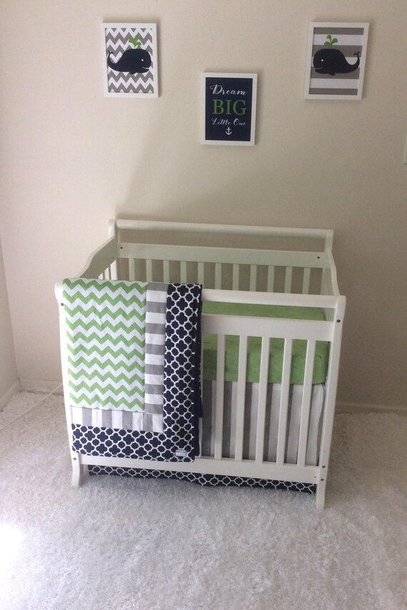 green mini crib