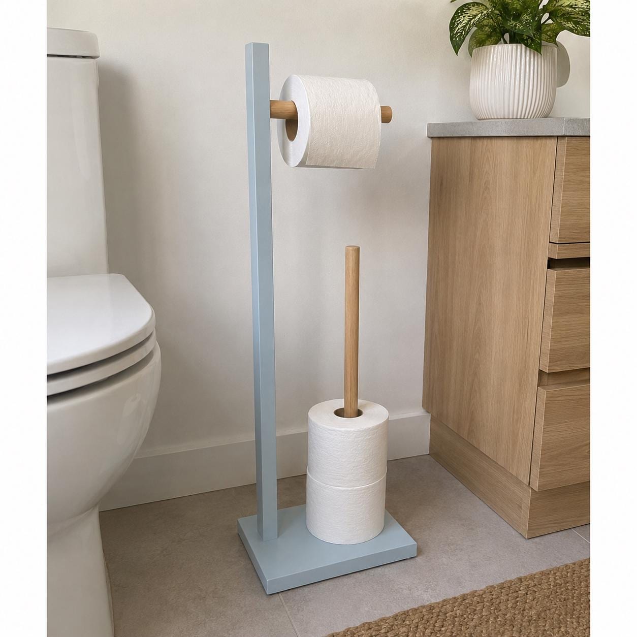 Standing toilet paper holder