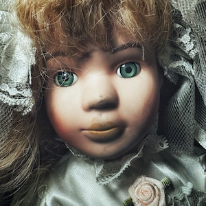 HAUNTED DOLL - vintage porcelain doll with spirit attachment - Rosemary
