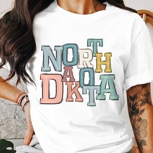 North Dakota T-Shirt, State Pride Tee, Colorful ND Graphic Shirt, Travel Souvenir, Gift for North Dakota Native, ND Lover T Shirt