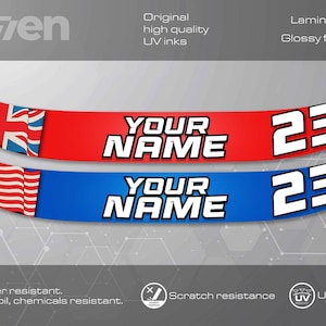 Puede incluir: Dos calcomanías de motocicleta rojo, blanco y azul con el texto "YOUR NAME" y el número "23". Las calcomanías son resistentes al agua, al combustible, al aceite y a los productos químicos, resistentes a los arañazos y tienen protección UV.
