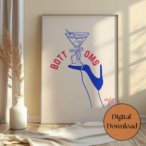 May include: A blue illustration of a high heel holding a martini glass with olives. The text "BOTTOMS UP" is written in red and blue letters.