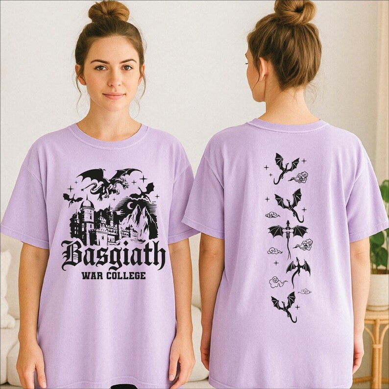 A woman wearing a purple t-shirt with a graphic design featuring a castle and dragon silhouettes.