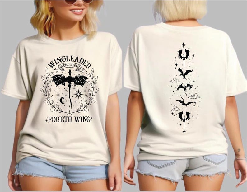 A woman wearing a white t-shirt with a graphic design featuring a dragon and the text "WINGLEADER - RIDER OF THE GARDEN - FOURTH WING".