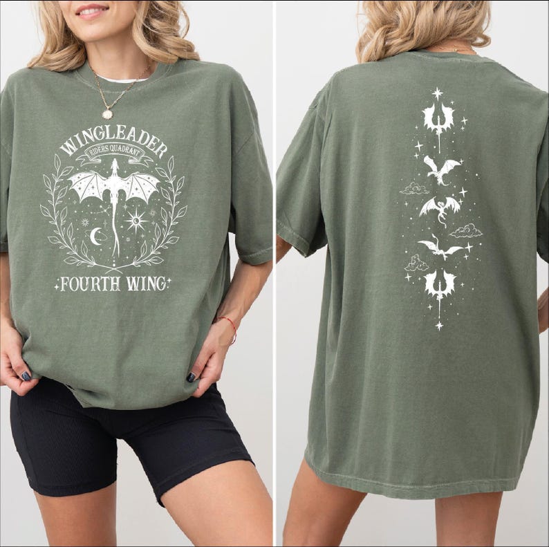 A woman wearing a green t-shirt with a graphic design on the front and back.