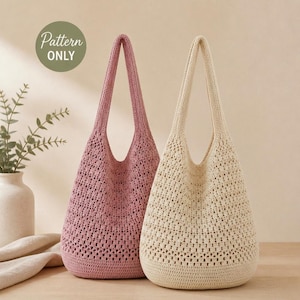 May include: Two crochet hobo bags, one in dusty rose and one in cream, featuring an openwork stitch pattern and a single shoulder strap. A circular green graphic in the upper left corner contains the white text Pattern ONLY.