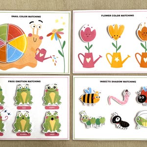 K&ouml;nnte beinhalten: Vier druckbare Aktivit&auml;tskarten f&uuml;r Kinder mit Zuordnungsspielen. Die Karten beinhalten ein Schnecken-Farbzuordnungsspiel, ein Blumen-Farbzuordnungsspiel, ein Frosch-Emotionszuordnungsspiel und ein Insekten-Schattenzuordnungsspiel.